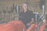 tractor inside machine barn